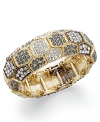 Sparkling glass crystals add edgy glamour to INC International Concepts' golden bangle bracelet. Crafted in gold tone mixed metal. Approximate long: 7 inches. Sparkling glass crystals add edgy glamour to INC International Concepts' golden bangle bracelet. Crafted in gold tone mixed metal. Approximate long: 7 inches.