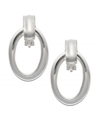 Channel the spirit of the 80s in chic, door knocker style. Lauren by Ralph Lauren earrings feature an oval hoop and post setting crafted in smooth, silver tone mixed metal. Approximate drop: 1-1/4 inches. Channel the spirit of the 80s in chic, door knocker style. Lauren by Ralph Lauren earrings feature an oval hoop and post setting crafted in smooth, silver tone mixed metal. Approximate drop: 1-1/4 inches.