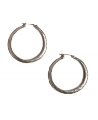 Every girl must own the perfect pair of hoops. Complementary to any ensemble, these Lucky Brand earrings feature a small-sized hoop with a hammered surface in silver tone mixed metal. Approximate diameter: 1-3/4 inches. Every girl must own the perfect pair of hoops. Complementary to any ensemble, these Lucky Brand earrings feature a small-sized hoop with a hammered surface in silver tone mixed metal. Approximate diameter: 1-3/4 inches.