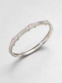 Three cushion-cut pink crystal stones set in textured sterling silver. Pink crystalSterling silverDiameter, about 2.3Hinged, push clasp closureImported Three cushion-cut pink crystal stones set in textured sterling silver. Pink crystalSterling silverDiameter, about 2.3Hinged, push clasp closureImported