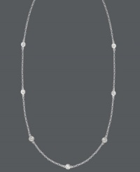 Sparkle by the inch. 11 stations of round-cut cubic zirconias (9/10 ct. t.w.) adorn B. Brilliant's lovely sterling silver necklace. Approximate length: 24 inches. Sparkle by the inch. 11 stations of round-cut cubic zirconias (9/10 ct. t.w.) adorn B. Brilliant's lovely sterling silver necklace. Approximate length: 24 inches.
