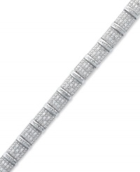 A shimmering statement. This bold sterling silver bracelet sparkles with round and baguette-cut diamonds (2 ct. t.w.) and is sure to leave a lasting impression at any formal affair. Approximate length: 7-1/4 inches. A shimmering statement. This bold sterling silver bracelet sparkles with round and baguette-cut diamonds (2 ct. t.w.) and is sure to leave a lasting impression at any formal affair. Approximate length: 7-1/4 inches.