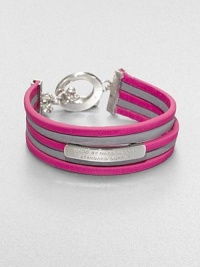Strips of bright leather alternate in this innovative design, with a bold signature ID tag and toggle close.LeatherRhodium and palladium finishingLength, about7.25Width, about 1.5Toggle closureImported Strips of bright leather alternate in this innovative design, with a bold signature ID tag and toggle close.LeatherRhodium and palladium finishingLength, about7.25Width, about 1.5Toggle closureImported