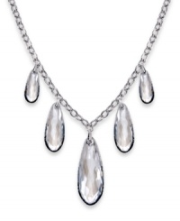 Graceful and gorgeous. With five dangling clear Swarovski crystals in an exclusive cut and embellished by gradated crystal Pointiage, Swarovski's Perfection necklace lives up to its name. Set in silver tone mixed metal. Approximate length: 16 inches. Approximate drop: 2-1/2 inches. Graceful and gorgeous. With five dangling clear Swarovski crystals in an exclusive cut and embellished by gradated crystal Pointiage, Swarovski's Perfection necklace lives up to its name. Set in silver tone mixed metal. Approximate length: 16 inches. Approximate drop: 2-1/2 inches.