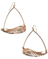 RACHEL Rachel Roy gives a classic pair of hoops a little extra lift! Intricate wings decorated by topaz-hued glass accents shimmer within a rose gold tone mixed metal setting. Approximate drop: 3 inches.