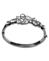 The elegance begins with Givenchy. Adorned with shimmering crystal glass accents, this Givenchy bangle bracelet is crafted in light hematite-plated mixed metal. Approximate diameter: 2-1/2 inches x 2 inches. The elegance begins with Givenchy. Adorned with shimmering crystal glass accents, this Givenchy bangle bracelet is crafted in light hematite-plated mixed metal. Approximate diameter: 2-1/2 inches x 2 inches.