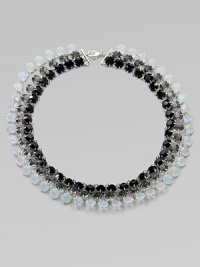 Three strands of shimmering Swarovski crystals in jet, opal and smoke shades, richly faceted in polished prong settings.CrystalSilverplatedLength, about 18¾Lobster claspMade in Italy Three strands of shimmering Swarovski crystals in jet, opal and smoke shades, richly faceted in polished prong settings.CrystalSilverplatedLength, about 18¾Lobster claspMade in Italy