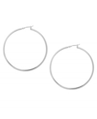 Don't mess with perfection. These traditional hoop earrings from Kenneth Cole New York are crafted in silver tone mixed metal with a click-top closure. Approximate diameter: 2 inches. Don't mess with perfection. These traditional hoop earrings from Kenneth Cole New York are crafted in silver tone mixed metal with a click-top closure. Approximate diameter: 2 inches.