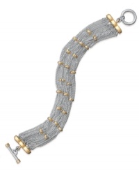 Classic yet cool. This wear-anywhere bracelet from Lauren by Ralph Lauren is ideal for the workplace or weekend with shiny silver tone chains and 14k gold-plated accents. Approximate length: 7-3/4 inches. Classic yet cool. This wear-anywhere bracelet from Lauren by Ralph Lauren is ideal for the workplace or weekend with shiny silver tone chains and 14k gold-plated accents. Approximate length: 7-3/4 inches.