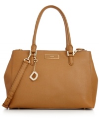 Opt for something elegant in your everyday accessorizing with this chic shoper from DKNY. Sumptuous leather is accented with golden hardware and signature charm, while the roomy interior allows you to bring along almost anything. Opt for something elegant in your everyday accessorizing with this chic shoper from DKNY. Sumptuous leather is accented with golden hardware and signature charm, while the roomy interior allows you to bring along almost anything.