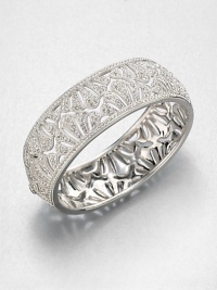 Shell Pattern Sparkle BangleThe lacy shell pattern of this shimmering pavé design is as feminine as it is fabulous.CrystalRhodium platingDiameter, about 2.25Hinged with tongue-and-groove claspImported Shell Pattern Sparkle BangleThe lacy shell pattern of this shimmering pavé design is as feminine as it is fabulous.CrystalRhodium platingDiameter, about 2.25Hinged with tongue-and-groove claspImported