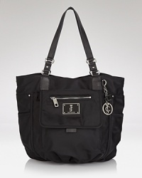 Glamor-girl brand Juicy Couture takes a practical approach to accessorizing with this nylon tote bag. Ideally sized for days on the go, it perfects easy-chic style. Glamor-girl brand Juicy Couture takes a practical approach to accessorizing with this nylon tote bag. Ideally sized for days on the go, it perfects easy-chic style.