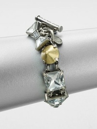 A modern mix of faceted rhinestones and conical, metal studs set in a linked design. Glass stonesOxidized zinc and brassLength, about 7.5Toggle closureImported A modern mix of faceted rhinestones and conical, metal studs set in a linked design. Glass stonesOxidized zinc and brassLength, about 7.5Toggle closureImported