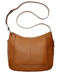 Take this fabulously functional Tignanello design with you wherever your adventures may lead. Supple leather, silver-tone hardware and detail stitching add instant panache, while the convenient crossbody strap keeps hands free when you're on the move. Take this fabulously functional Tignanello design with you wherever your adventures may lead. Supple leather, silver-tone hardware and detail stitching add instant panache, while the convenient crossbody strap keeps hands free when you're on the move.