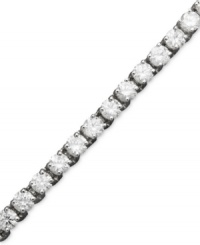 Diamond decadence. She will love you forever when she opens this gift. Tennis bracelet features a sparkling row of round-cut diamond (8 ct. t.w.) crafted in 14k white gold. Approximate length: 7 inches. Diamond decadence. She will love you forever when she opens this gift. Tennis bracelet features a sparkling row of round-cut diamond (8 ct. t.w.) crafted in 14k white gold. Approximate length: 7 inches.