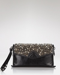 Sam Edelman's leather clutch is your perfect party companion. Toughened up with studded details, our favorite new accessory features a versatile wrist strap and enough room for the after-hours essentials. Sam Edelman's leather clutch is your perfect party companion. Toughened up with studded details, our favorite new accessory features a versatile wrist strap and enough room for the after-hours essentials.