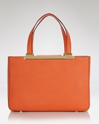 MICHAEL Michael Kors' day-right totes are a must for any well-attired wardrobe. This leather style flaunts a refined shape and the brand's signature detailing. MICHAEL Michael Kors' day-right totes are a must for any well-attired wardrobe. This leather style flaunts a refined shape and the brand's signature detailing.