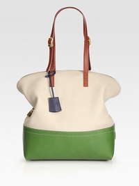 Stash your essentials in this colorblocked silhouette of pebble grain and matte leather.Adjustable double shoulder straps, 9¼-10½ dropTop zip closureTwo inside open pocketsCenter zip compartmentLinen lining11W X 13H X 5¼DMade in Italy Stash your essentials in this colorblocked silhouette of pebble grain and matte leather.Adjustable double shoulder straps, 9¼-10½ dropTop zip closureTwo inside open pocketsCenter zip compartmentLinen lining11W X 13H X 5¼DMade in Italy