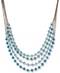 Immerse your style with the enchanting hues on c.A.K.e. by Ali Khan's beaded styles. Turquoise-color faceted rondelles combine with a four-row gold tone mixed metal setting for a totally chic look. Approximate length: 16-17-1/2 inches + 3-inch extender. Approximate drop length: 1-1/2 inches. Immerse your style with the enchanting hues on c.A.K.e. by Ali Khan's beaded styles. Turquoise-color faceted rondelles combine with a four-row gold tone mixed metal setting for a totally chic look. Approximate length: 16-17-1/2 inches + 3-inch extender. Approximate drop length: 1-1/2 inches.