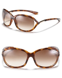 Tom Ford's popular open temple sunglasses get a fashionable update with brown gradient lenses. Tom Ford's popular open temple sunglasses get a fashionable update with brown gradient lenses.