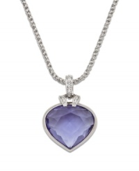 Splash your neckline with this lovable heart pendant in a bright pool of color. Swarovski necklace features a heart-shaped oceanic tanzanite set in silver tone mixed metal with clear crystal accents at the bail. Approximate length: 15-7/8 inches. Approximate drop: 1-3/4 inches. Splash your neckline with this lovable heart pendant in a bright pool of color. Swarovski necklace features a heart-shaped oceanic tanzanite set in silver tone mixed metal with clear crystal accents at the bail. Approximate length: 15-7/8 inches. Approximate drop: 1-3/4 inches.