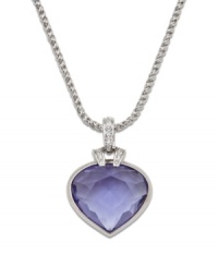 Splash your neckline with this lovable heart pendant in a bright pool of color. Swarovski necklace features a heart-shaped oceanic tanzanite set in silver tone mixed metal with clear crystal accents at the bail. Approximate length: 15-7/8 inches. Approximate drop: 1-3/4 inches.