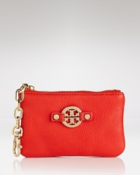 From Tory Burch's Amanda collection, a leather inlaid logo dresses up this petite leather coin pouch, detailed by a gleaming link strap. From Tory Burch's Amanda collection, a leather inlaid logo dresses up this petite leather coin pouch, detailed by a gleaming link strap.