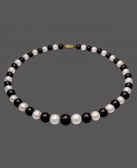 The perfect picture of contrast. This necklace features a strand of alternating cultured freshwater pearls (8-12 mm) and onyx beads (8-12 mm). Set in 14k gold. Approximate length: 18 inches. The perfect picture of contrast. This necklace features a strand of alternating cultured freshwater pearls (8-12 mm) and onyx beads (8-12 mm). Set in 14k gold. Approximate length: 18 inches.