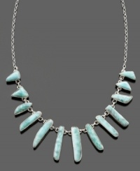 A wild necklace with swirling beauty featuring larimer set in sterling silver. Approximate length: 18 inches. Approximate drop: 2 inches. A wild necklace with swirling beauty featuring larimer set in sterling silver. Approximate length: 18 inches. Approximate drop: 2 inches.