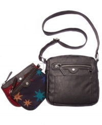 Easygoing and outfitted for adventure, this travel-ready crossbody from Tyler Rodan is the perfect companion. With a sturdy adjustable strap, plenty of pockets and secure zip-top closure, it includes 2 complementary zip pouches for extra convenience. Easygoing and outfitted for adventure, this travel-ready crossbody from Tyler Rodan is the perfect companion. With a sturdy adjustable strap, plenty of pockets and secure zip-top closure, it includes 2 complementary zip pouches for extra convenience.