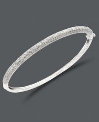 Slip a little luster over your wrist. This sparkling bangle by Victoria Townsend features a smooth sterling silver setting decorated with round-cut diamonds (1/4 ct. t.w.). Approximate diameter: 2-1/2 inches. Slip a little luster over your wrist. This sparkling bangle by Victoria Townsend features a smooth sterling silver setting decorated with round-cut diamonds (1/4 ct. t.w.). Approximate diameter: 2-1/2 inches.