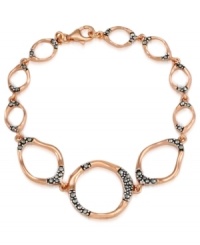 Add some glitter and glam to your look. Genevieve & Grace's pretty hammered circle link bracelet features sparkling marcasite in 18k rose gold over sterling silver. Approximate length: 7 inches. Add some glitter and glam to your look. Genevieve & Grace's pretty hammered circle link bracelet features sparkling marcasite in 18k rose gold over sterling silver. Approximate length: 7 inches.