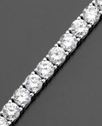 Grace your wrist with a never-ending circle of beautiful round-cut cubic zirconias (10 ct. t.w.). This tennis bracelet by CRISLU is set in sterling silver finished in platinum. Approximate length: 7 inches. Grace your wrist with a never-ending circle of beautiful round-cut cubic zirconias (10 ct. t.w.). This tennis bracelet by CRISLU is set in sterling silver finished in platinum. Approximate length: 7 inches.
