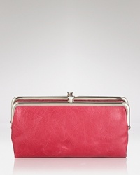 Sleek and shiny, this Hobo leather wallet is a chic home for your cash. Sleek and shiny, this Hobo leather wallet is a chic home for your cash.