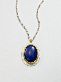 A beautiful, speckled lapis cabochon set in sterling silver and 24k gold on a link chain. LapisSterling silver24k goldLength, about 17.7Pendant size, about 1.2Lobster clasp closureImported A beautiful, speckled lapis cabochon set in sterling silver and 24k gold on a link chain. LapisSterling silver24k goldLength, about 17.7Pendant size, about 1.2Lobster clasp closureImported