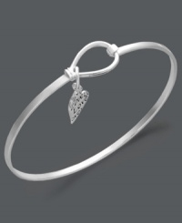 All you need in life is love. This inspirational bangle features a loop and hook design and a dangling heart-shaped charm engraved with the word Love. Crafted in sterling silver. Approximate diameter: 2-1/2 inches. Approximate charm size: 1/3 inch. All you need in life is love. This inspirational bangle features a loop and hook design and a dangling heart-shaped charm engraved with the word Love. Crafted in sterling silver. Approximate diameter: 2-1/2 inches. Approximate charm size: 1/3 inch.