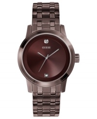 Diamond accents stand out on this polished steel watch from GUESS. Diamond accents stand out on this polished steel watch from GUESS.