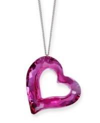 Capture an innovative silhouette of style. Swarovski's iconic Loveheart Pendant gleams in cut-out fuchsia crystal. This playful pendant comes on a silver tone mixed metal chain. Approximate length: 16-1/2 inches. Approximate drop: 1-1/4 inches.