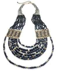 The gorgeous combination of black and gold rains down on this long multi-strand necklace from Style& co. With glass, metal and wooden beads. Crafted in antiqued gold tone mixed metal. Approximate length: 30 inches + 3-inch extender. The gorgeous combination of black and gold rains down on this long multi-strand necklace from Style& co. With glass, metal and wooden beads. Crafted in antiqued gold tone mixed metal. Approximate length: 30 inches + 3-inch extender.