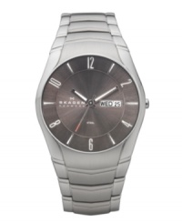 Innovative links seamlessly connect to the case of this sleek Skagen Denmark watch. Stainless steel bracelet and round case. Brushed gray dial features silver tone numerals and stick indices at markers, day and date window at three o'clock, logo at nine o'clock and three hands. Quartz movement. Water resistant to 30 meters. Limited lifetime warranty. Innovative links seamlessly connect to the case of this sleek Skagen Denmark watch. Stainless steel bracelet and round case. Brushed gray dial features silver tone numerals and stick indices at markers, day and date window at three o'clock, logo at nine o'clock and three hands. Quartz movement. Water resistant to 30 meters. Limited lifetime warranty.