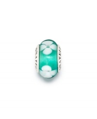 Ethereal white flower lie on a sea of blissful teal Murano glass on this beautiful sterling silver bead. Donatella is a playful collection of charm bracelets and necklaces that can be personalized to suit your style! Available exclusively at Macy's. Ethereal white flower lie on a sea of blissful teal Murano glass on this beautiful sterling silver bead. Donatella is a playful collection of charm bracelets and necklaces that can be personalized to suit your style! Available exclusively at Macy's.