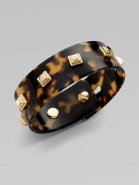 Dainty, two-tone resin design sprinkled in edgy goldtone studs. Goldtone metal plated resinDiameter, about 1Width, about 2½Made in Italy Dainty, two-tone resin design sprinkled in edgy goldtone studs. Goldtone metal plated resinDiameter, about 1Width, about 2½Made in Italy