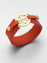 The quintessential balance of delicate femininity and edginess, this leather cuff features a striking goldplated logo detail.16k goldplated hardwareLeatherDiameter, 2.25Imported The quintessential balance of delicate femininity and edginess, this leather cuff features a striking goldplated logo detail.16k goldplated hardwareLeatherDiameter, 2.25Imported