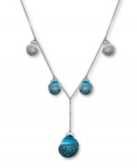 Dazzling and dramatic. Aquarmarine-hued crystals combine with clear crystal Pointiage® accents to enhance the beauty of Swarovski's Play Indicolite Y pendant necklace. Set in silver tone mixed metal. Approximate length: 15-7/10 inches. Approximate drop: 1-1/2 inches. Dazzling and dramatic. Aquarmarine-hued crystals combine with clear crystal Pointiage® accents to enhance the beauty of Swarovski's Play Indicolite Y pendant necklace. Set in silver tone mixed metal. Approximate length: 15-7/10 inches. Approximate drop: 1-1/2 inches.