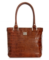 Add an exotic edge to practical accessorizing with this croc-embossed shopper from Anne Klein. The classic design is dressed up in signature hardware and stud accents, and ideally sized for all your it-girl essentials. Add an exotic edge to practical accessorizing with this croc-embossed shopper from Anne Klein. The classic design is dressed up in signature hardware and stud accents, and ideally sized for all your it-girl essentials.