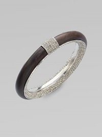 Brilliant rhinestones make this dark, subtly textured wood design pop. WoodGlass stonesSteelDiameter, about 2¼Slip-on styleImported Brilliant rhinestones make this dark, subtly textured wood design pop. WoodGlass stonesSteelDiameter, about 2¼Slip-on styleImported