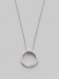 From the Tiny Treasures Collection. A simple circle shimmers and sparkles, outlined in diamonds and dangling from a chain of 18k white gold. Diamonds, 0.10 tcw 18k white gold Chain length, about 16 Pendant diameter, about ½ Lobster clasp Made in Italy