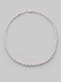 From the Akoya collection. A classic strand of white Akoya pearls with a pretty filigree clasp. 6.5mm white round cultured pearls Quality: A1 18k white gold Length, about 18 Mikimoto signature clasp Imported From the Akoya collection. A classic strand of white Akoya pearls with a pretty filigree clasp. 6.5mm white round cultured pearls Quality: A1 18k white gold Length, about 18 Mikimoto signature clasp Imported