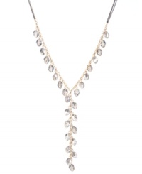 Long and luxurious. Kenneth Cole New York's subtly shimmering y-shaped necklace features faceted glass beads and crystal-encrusted discs in hematite hues. Chain crafted from gold tone mixed metal. Approximate length: 27 inches + 3-inch extender. Approximate drop: 7-1/2 inches. Long and luxurious. Kenneth Cole New York's subtly shimmering y-shaped necklace features faceted glass beads and crystal-encrusted discs in hematite hues. Chain crafted from gold tone mixed metal. Approximate length: 27 inches + 3-inch extender. Approximate drop: 7-1/2 inches.