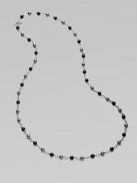 From the Bijoux Collection. A long elegant sterling silver strand of black onyx and hematite beads.Black onyx, hematite Sterling silver Length, about 40 Toggle closure Imported From the Bijoux Collection. A long elegant sterling silver strand of black onyx and hematite beads.Black onyx, hematite Sterling silver Length, about 40 Toggle closure Imported
